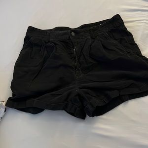 Black corduroy shorts. American Eagle size 12. True to size. Not stretchy